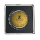 Reverse of the Cardiff Gold Lakshmi Ganesh gold coin in its capsule